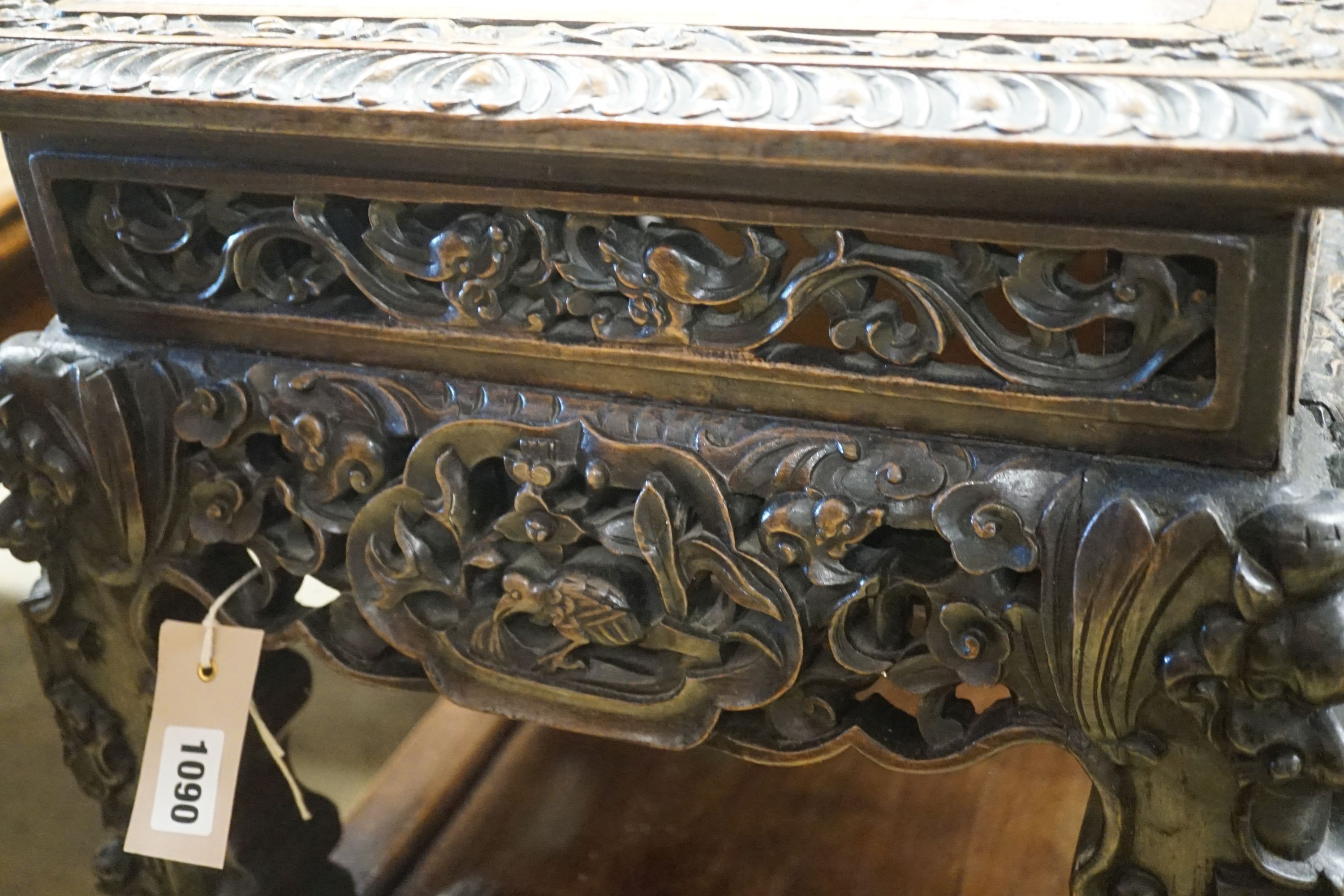 A Chinese carved hardwood two tier jardiniere stand with rouge marble top, width 43cm, depth 43cm, height 80cm